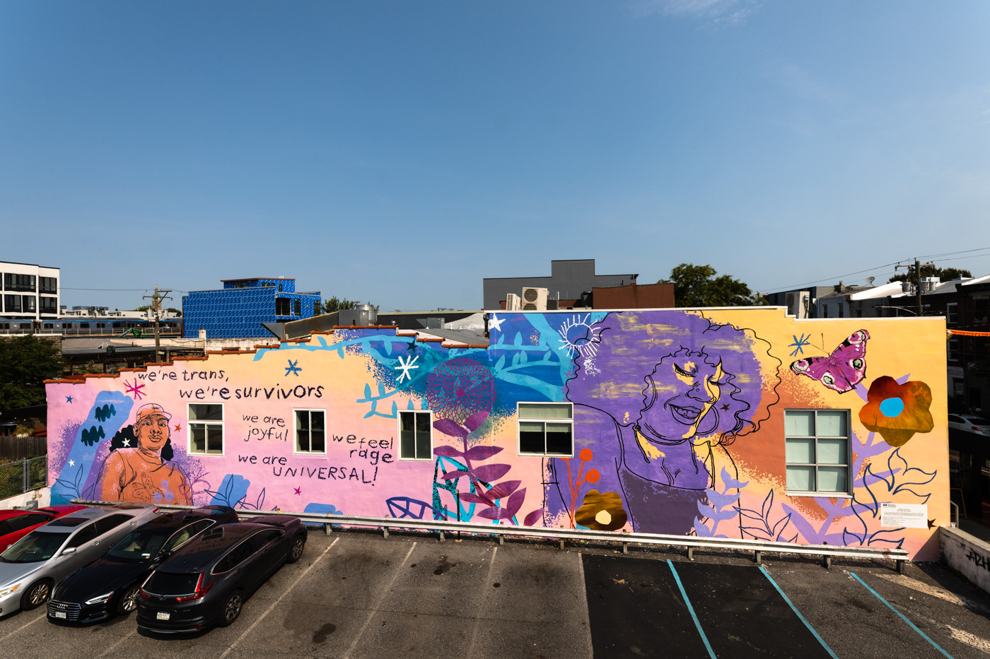 The 'We Are Universal' mural on Cake Life Bake Shop in Fishtown. We Are Universal © 2021 City of Philadelphia Mural Arts Program / Kah Yangni, Cake Life Bake Shop, 1306 Frankford Avenue. Photo by Steve Weinik.