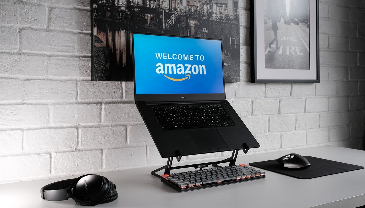 Laptop with Amazon logo displayed on the screen.