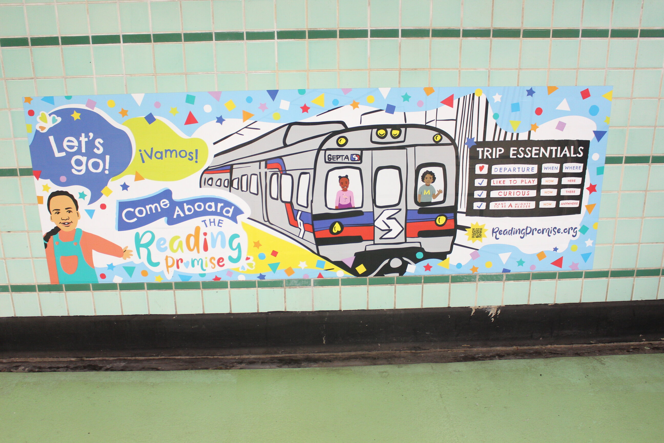 Come Aboard the Reading Promise sign at Tasker-Morris station. Photo credit: Emily Leopard-Davis/Al Día News