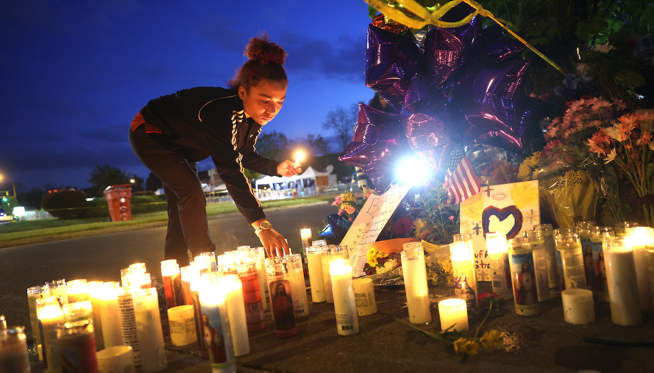 People mourn the 10 victims of a racially-motivated attack at a grocery store in Buffalo on Saturday, May 14. Photo: Scott Olson/Getty Images