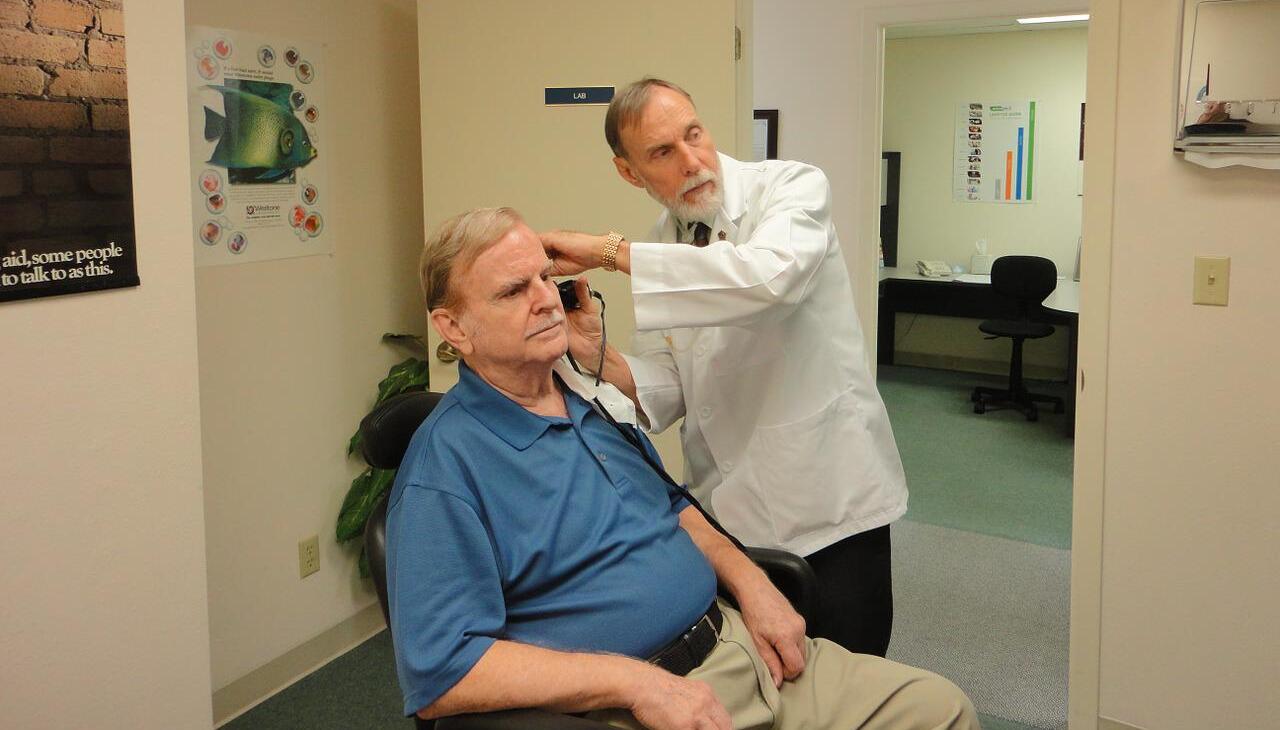 Deaf patient gets consultation. 