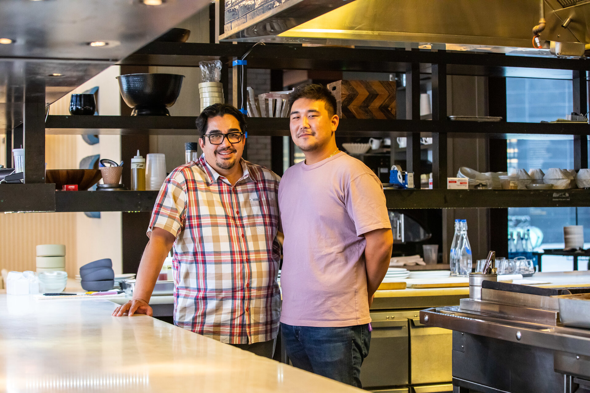 Alex Yoon (right) is the next Chef in Residency at Volver, selected by Iron Chef Jose Garces (left). Photo Courtesy of Eddy Marenco.