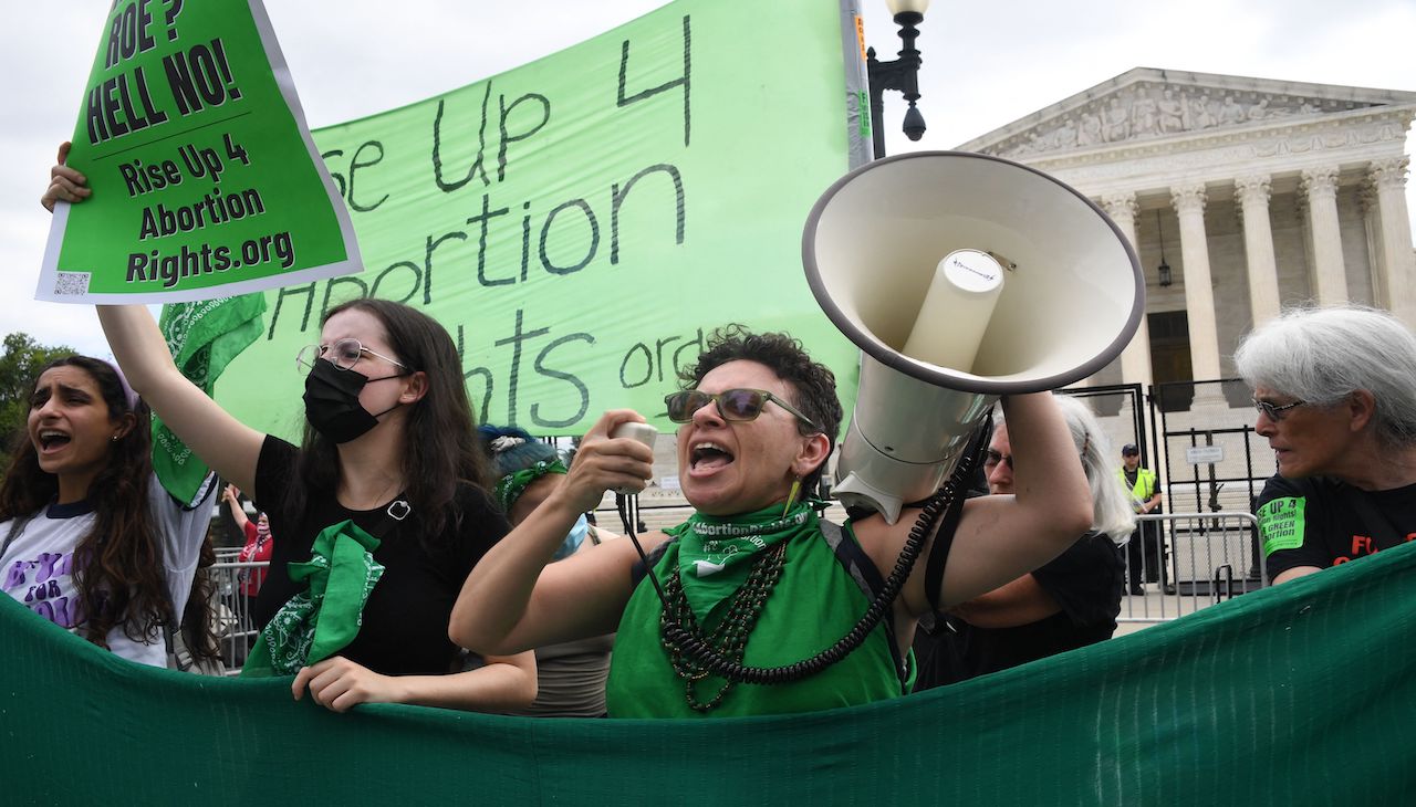 Pro-choice protestors outside the Supreme Court as the decision to overturn Roe v. Wade was released. Photo: Olivier Douliery/AFP via Getty Images.