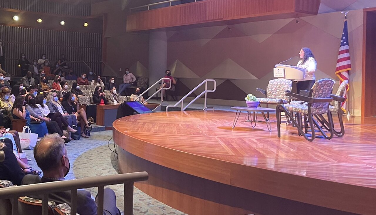 Isabel Casillas Guzmán giving speech in Los Angeles.