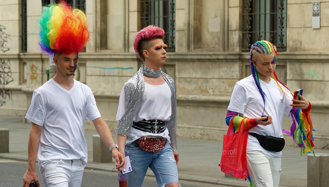 Young people walking on a Pride parade. 