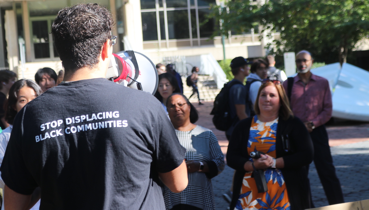 Pictured: Penn student activist speaks into a loudspeaker at press conference. Photo: Carlos Nogueras / AL DÍA News