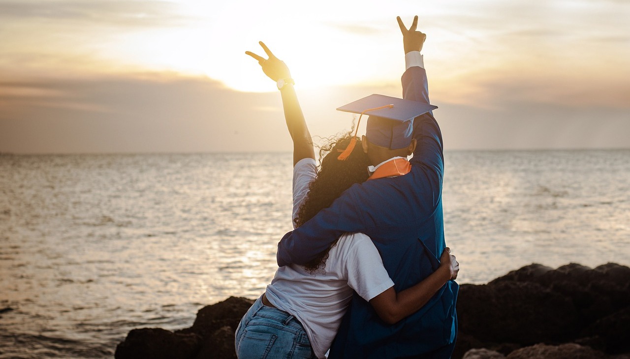 High school student celebrates his graduation.