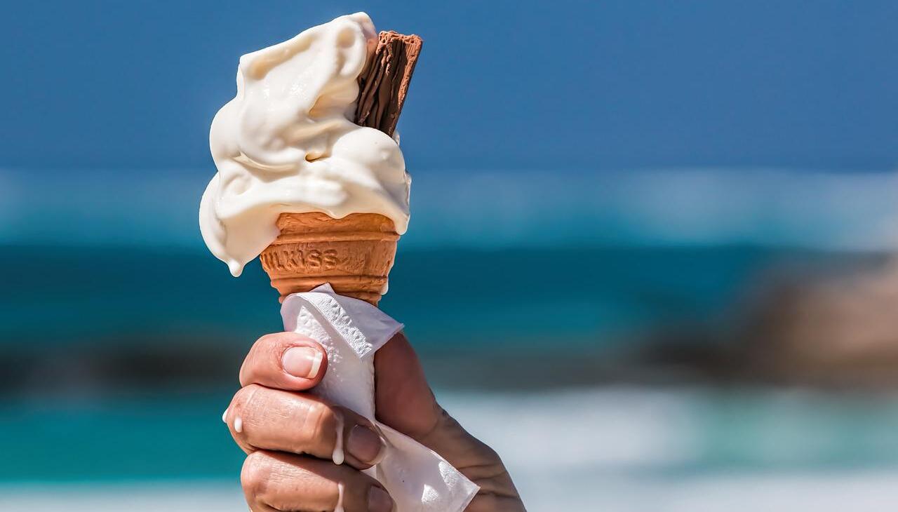 Ice cream melting on the beach.