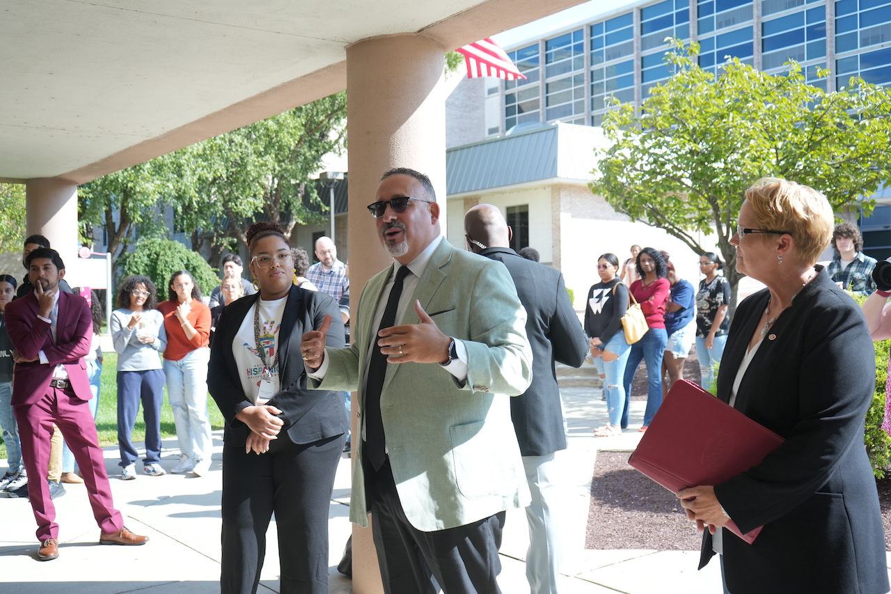 Secretary Miguel Cardona talking with students and staff at Reading Area Community College. 