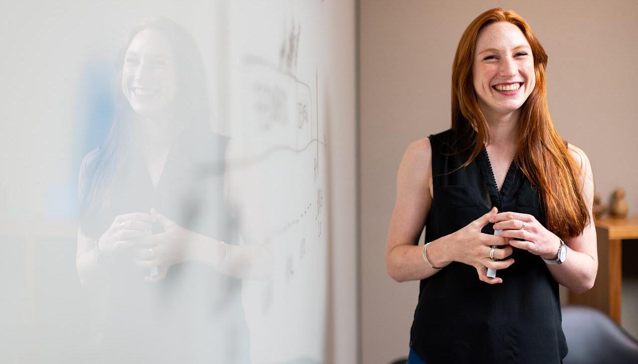 Woman leading a conference. 