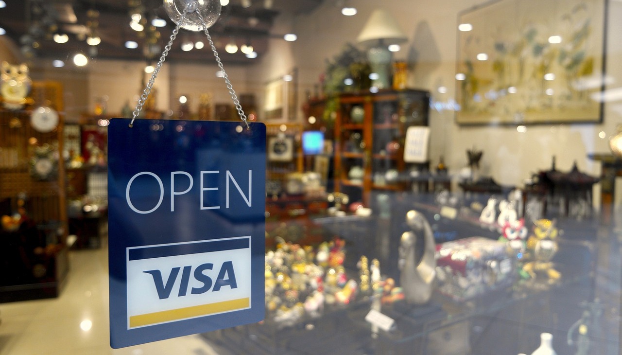 Open sign on a business door.