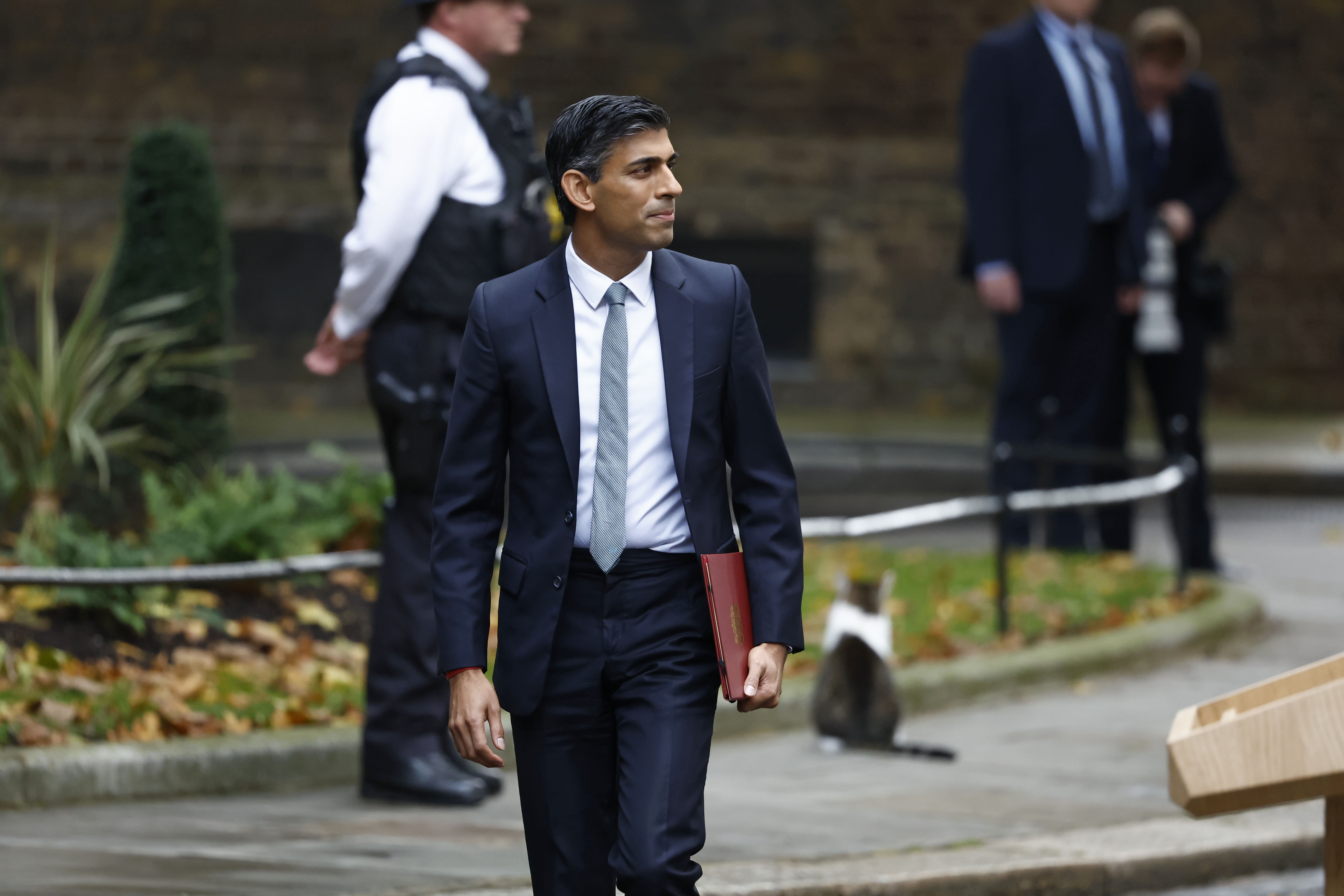 British Prime Minister Rishi Sunak arrives after taking office to make a statement outside Number 10 in Downing Street on October 25, 2022 in London, England. Photo by Jeff J Mitchell/Getty Images.