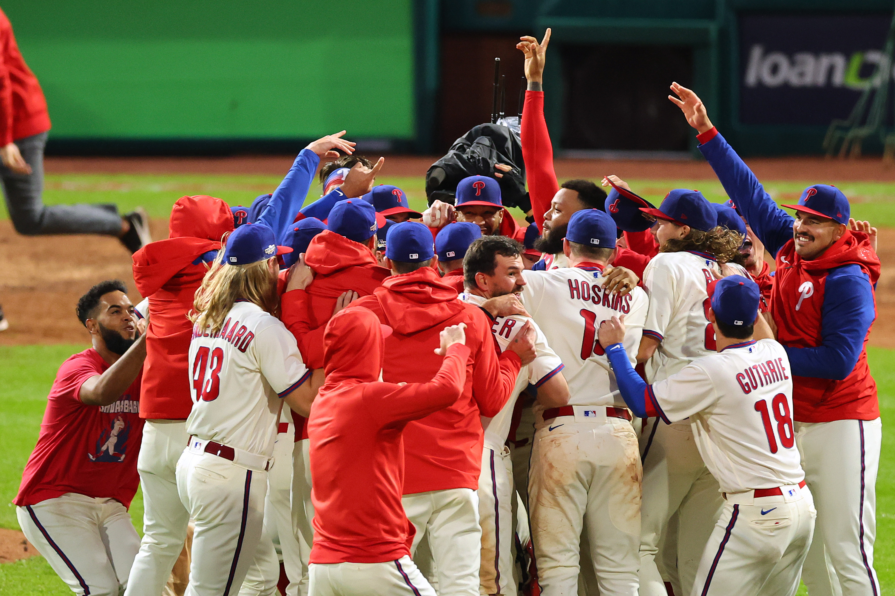 Members of the Philadelphia Phillies celebrate after defeating the San Diego Padres in Game 5 to win the National League Championship Series at Citizens Bank Park on Oct. 23, 2022 in Philadelphia. Photo: Michael Reaves/Getty Images.