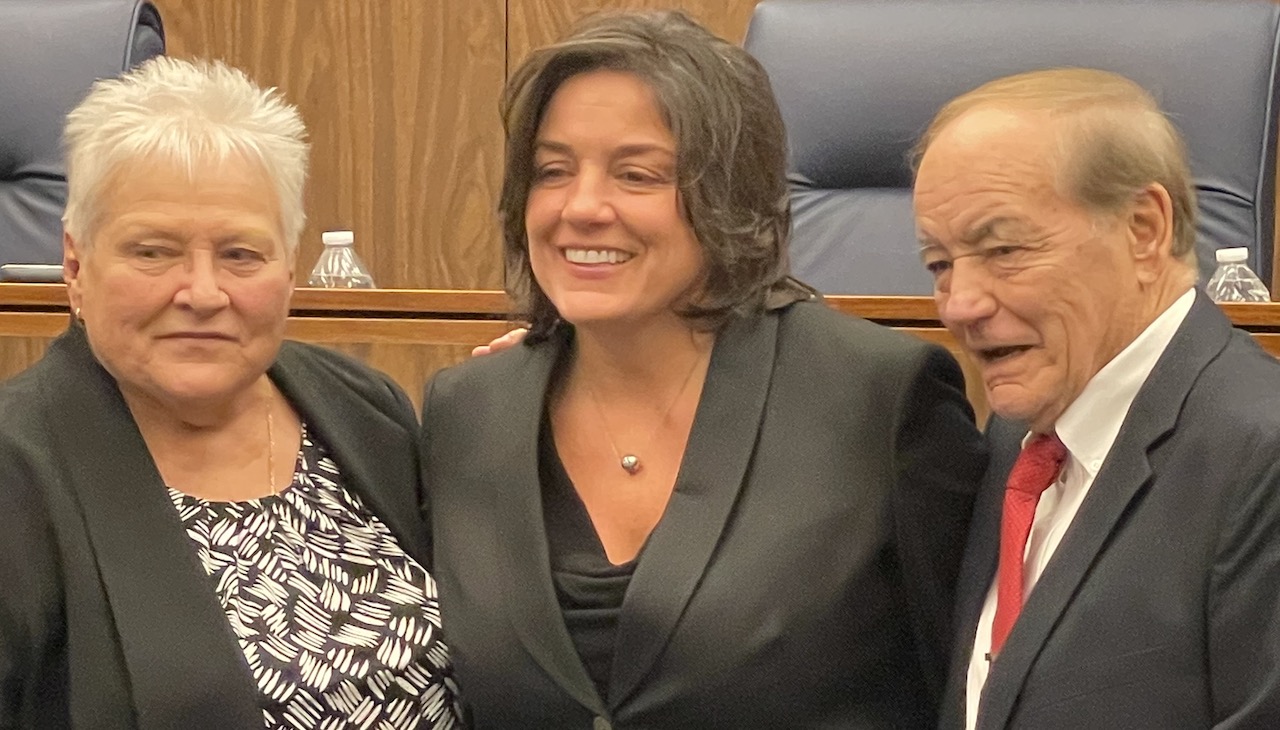 Pictured: Newly sworn in Jacqueline Romero with her parents. Photo: Hernán Guaracao/AL DÍA News.