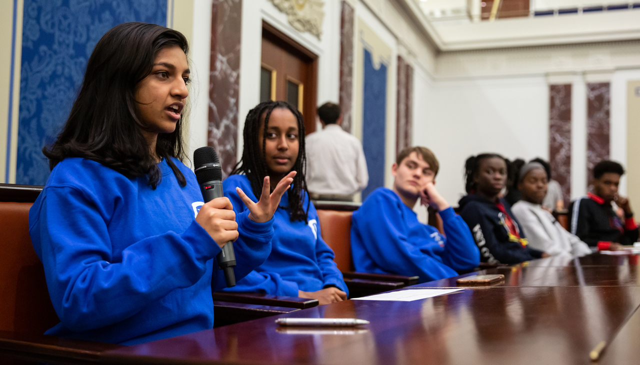 U.S. K-12 students at the Kennedy Institute's Senate replica. 