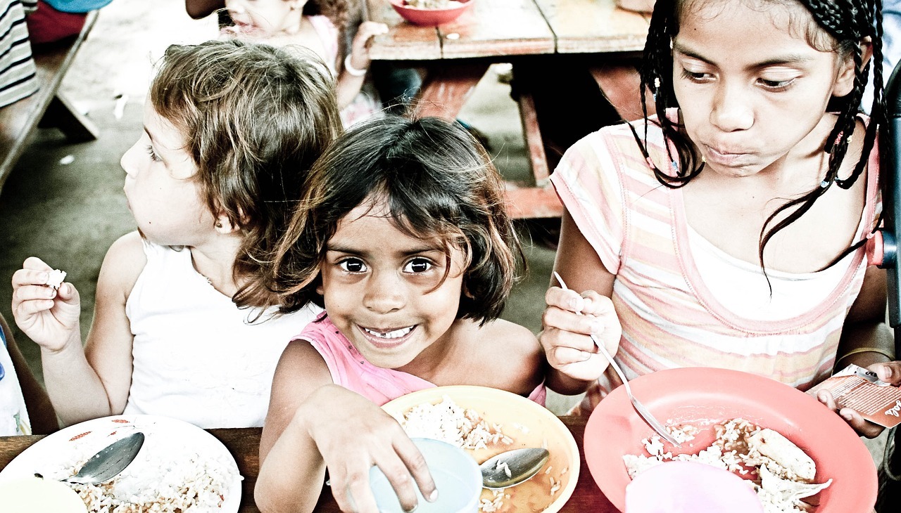 Orphan children having a meal. 