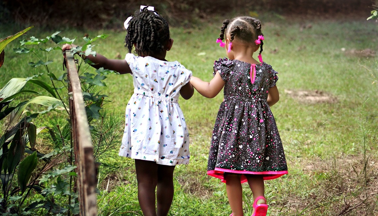 Two girl child on the country side. 