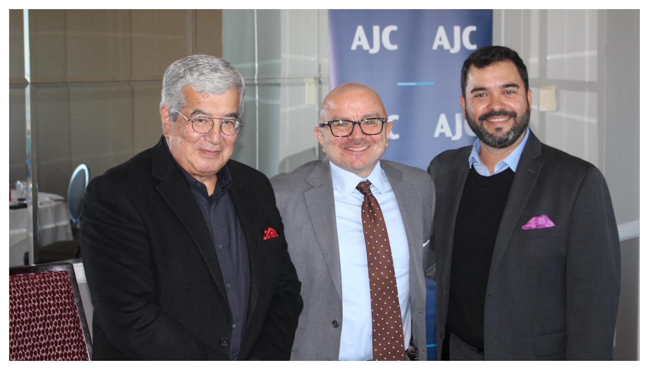 A photo of the AJC panelists standing next to each other. From left to right: Fernando Mendez, Larry Gonzalez, and Fernando Treviño.