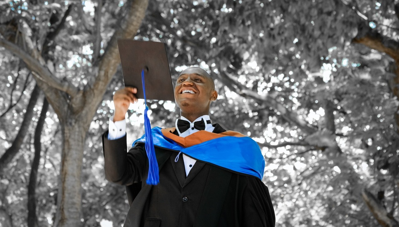 High school student celebrates his graduation.