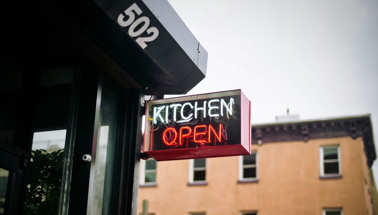 Open sign at a kitchen in New York.