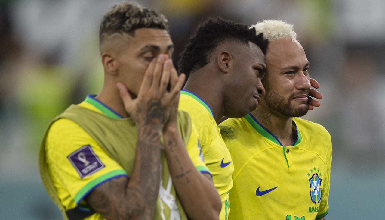 Brazilian players crying. 