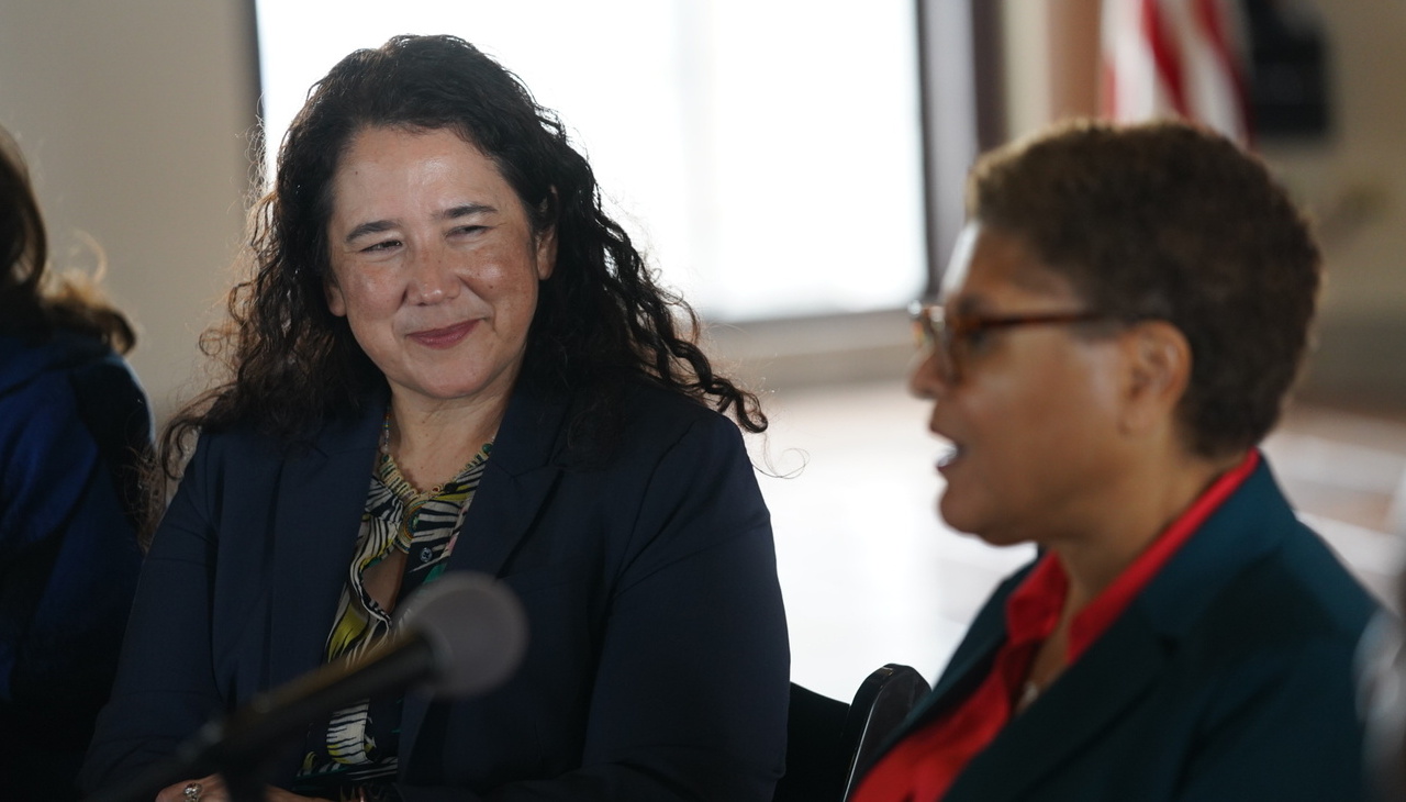 Isabel Casillas Guzmán, SBA Administrator, listening to LA Mayor Karen Bass.