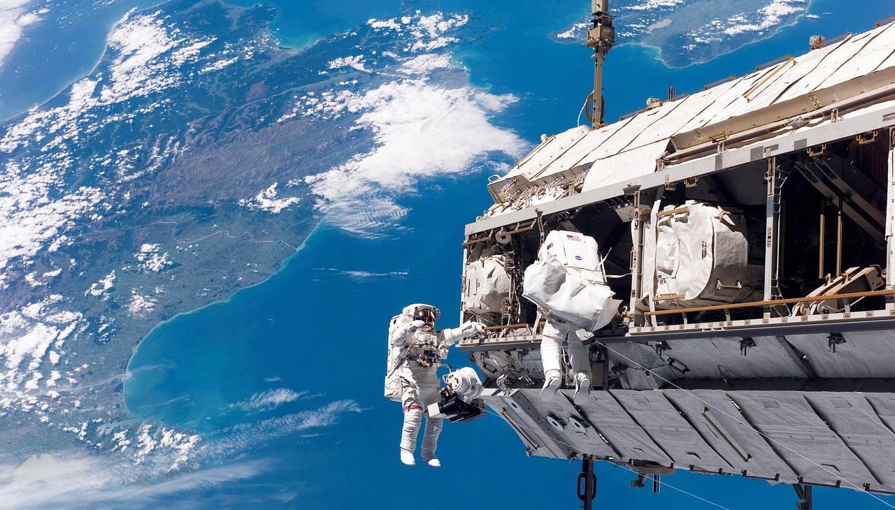 Astronaut doing a space walk.