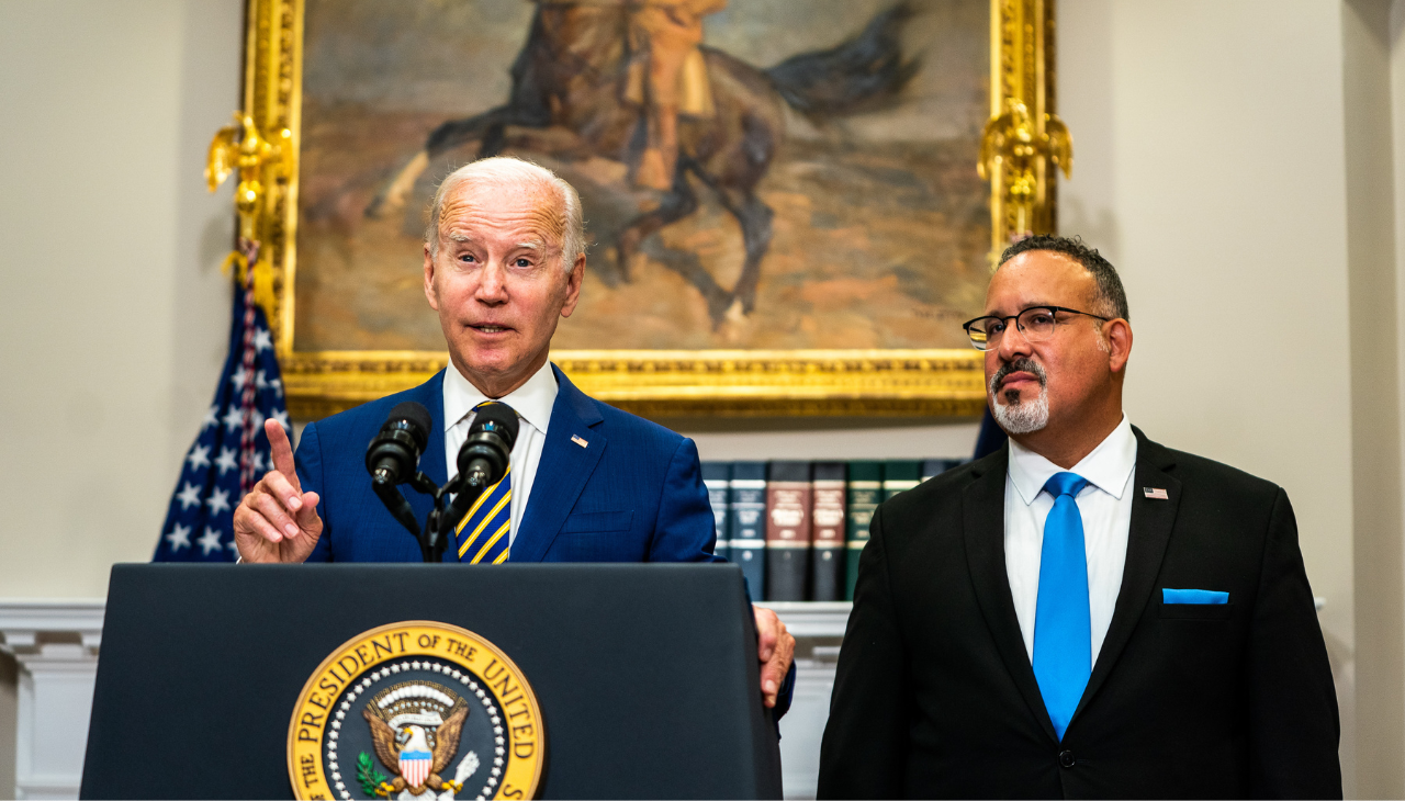 President Joe Biden and Education Secretary Miguel Cardona. 