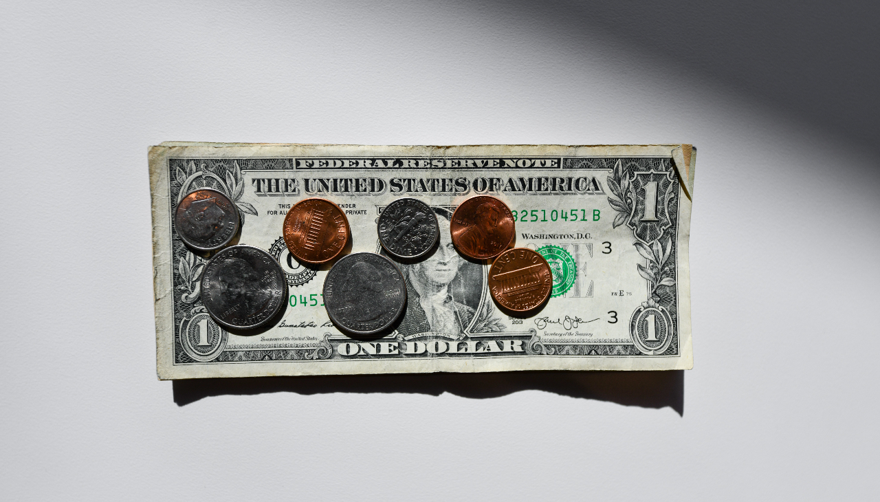 A dollar and change. Photo credit: Photo by Kenny Eliason on Unsplash