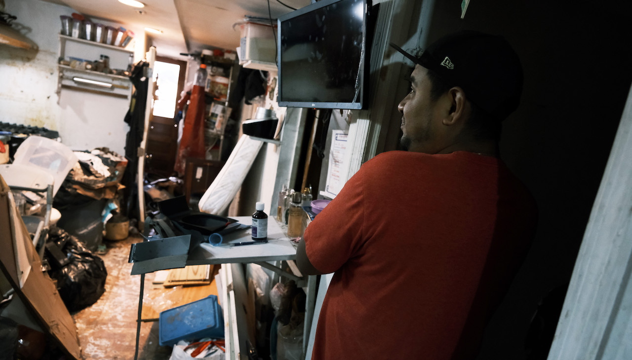 Eddie, a Mexican immigrant in Queens giving a tour of his washed out basement after Ida hit.