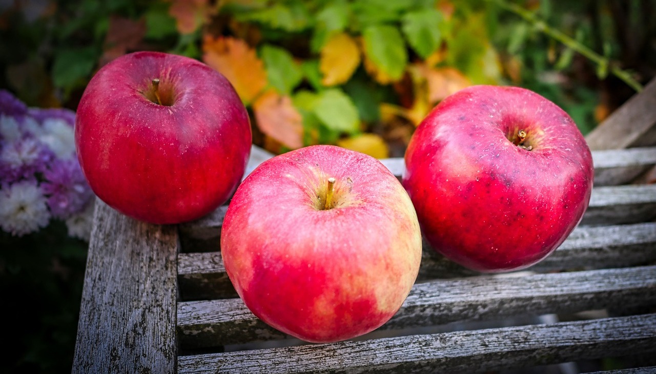 Apples on a stand. 