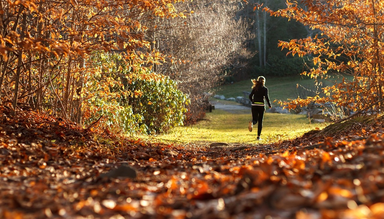 Girl running in the forest. 