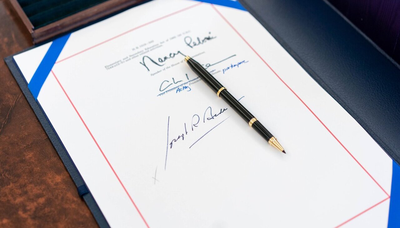 President Biden signs the American Rescue Plan into law.