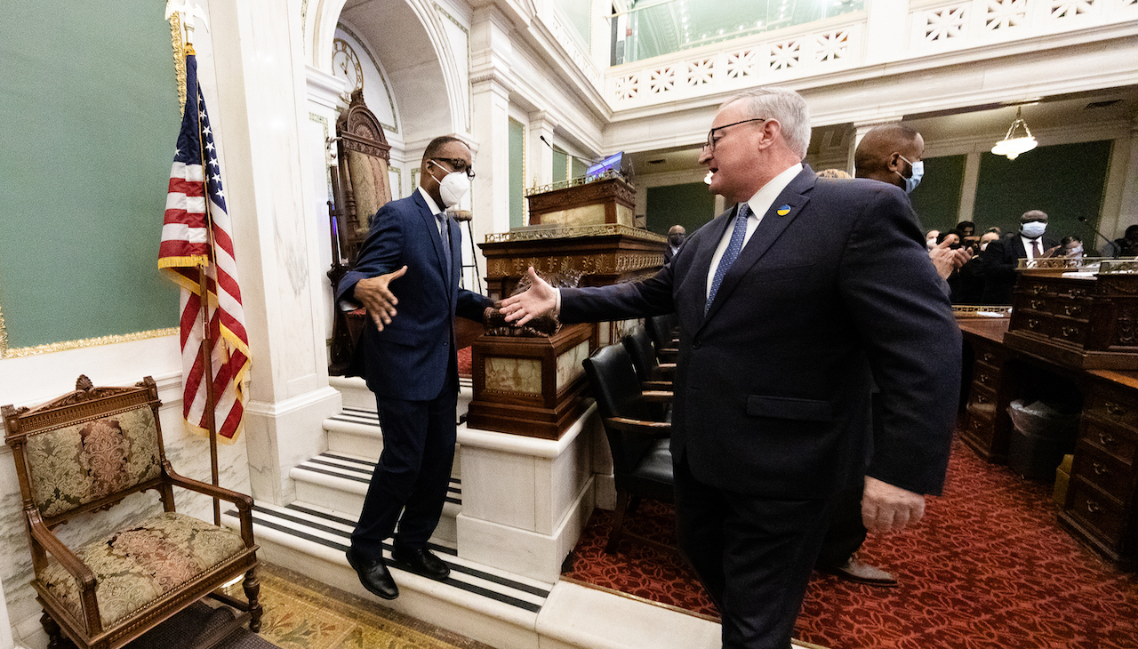 Kenney and Clarke shaking hands during Kenney's initial budget address in 2023.  Photo: Jared Piper/PHL Council