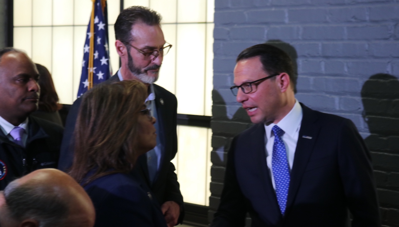 Governor Josh Shapiro speaks to Councimember Quetcy Lozada, who is standing next to Councilmember Jim Harrity. Behind them, State Representative Danilo Burgos.Photos: Carlos Nogueras/ Al DÍA News 