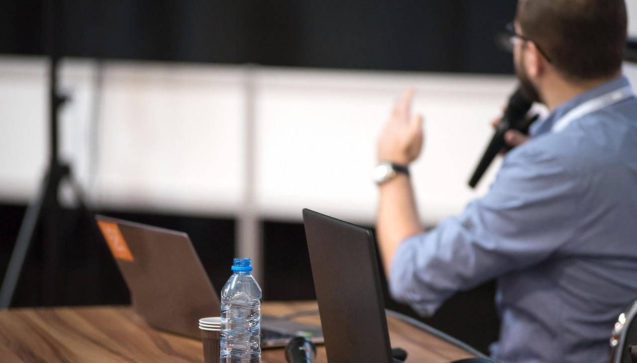 Teacher giving a conference. 