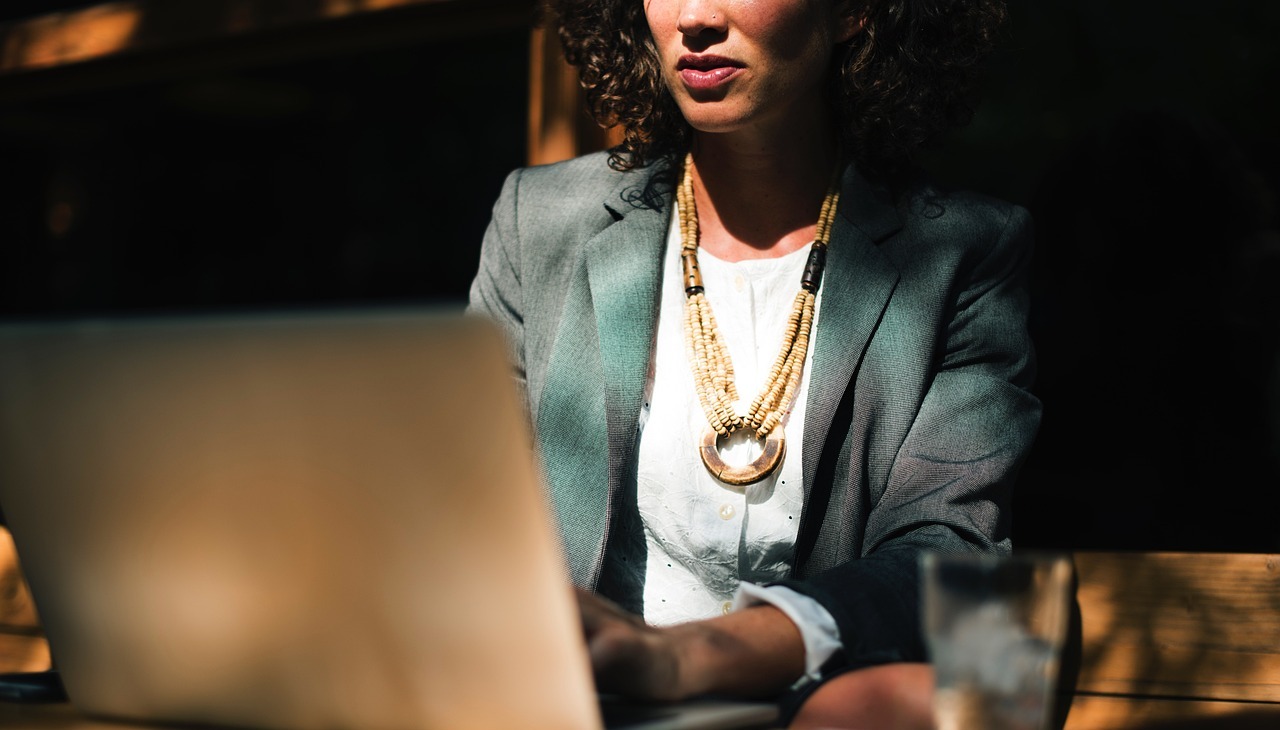 Businesswoman checking her laptop. 