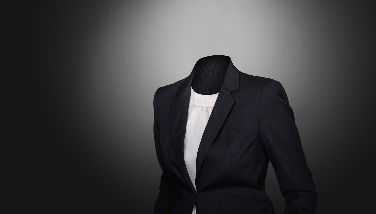 Graphic of a businesswoman suit. 