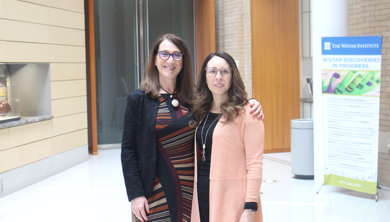 Dr. Maria Elena Bottazzi and Dr. Jessie Villanueva, friends since graduate school, were reunited at the Wistar Institute during its recent Women & Science event. Photo credit: Emily Leopard-Davis/AL DÍA News