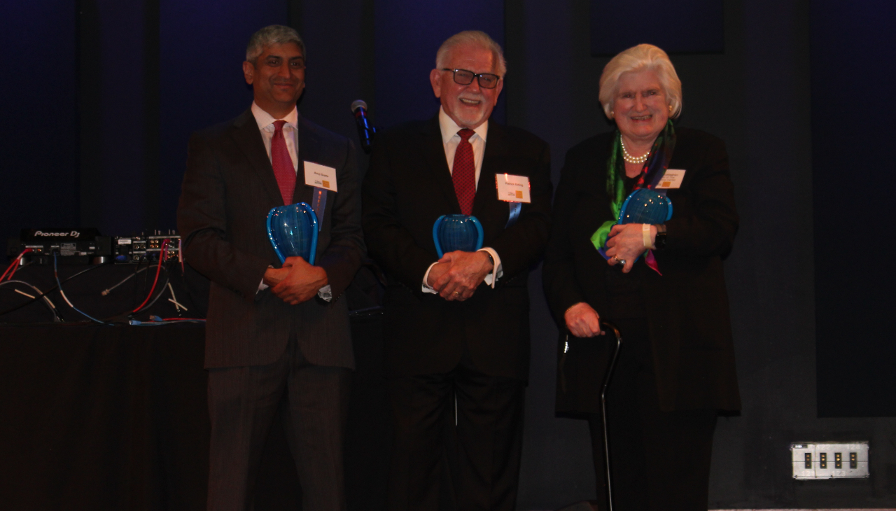 Anuj Gupta, Patrick Eiding, and Anne O'Callaghan pose for a photo with their 2023 Solas Awards. Photo credit: Jensen Toussaint/AL DÍA News