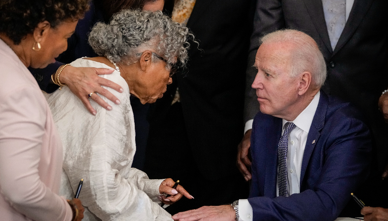 Opal Lee speaking to President Joe Biden after he signed the "Juneteenth National Independence Day Act" which made Juneteenth a federal holiday. Photo credit: Drew Angerer/Getty Images