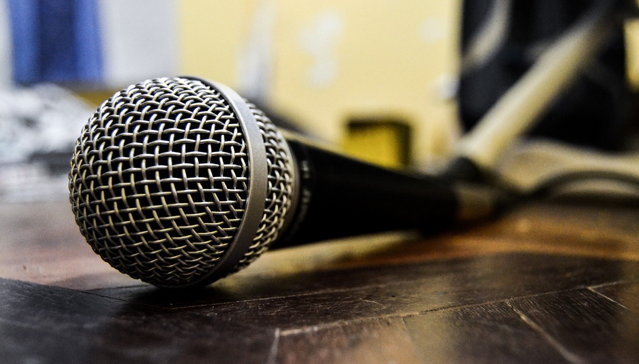 microphone placed on the floor of a stage. 