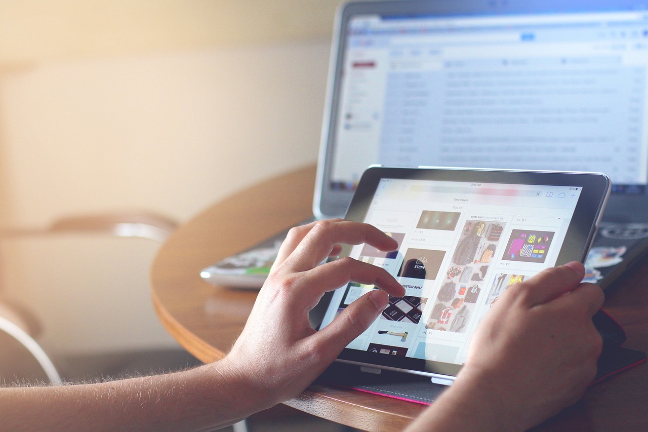 A woman browsing on her ipad.