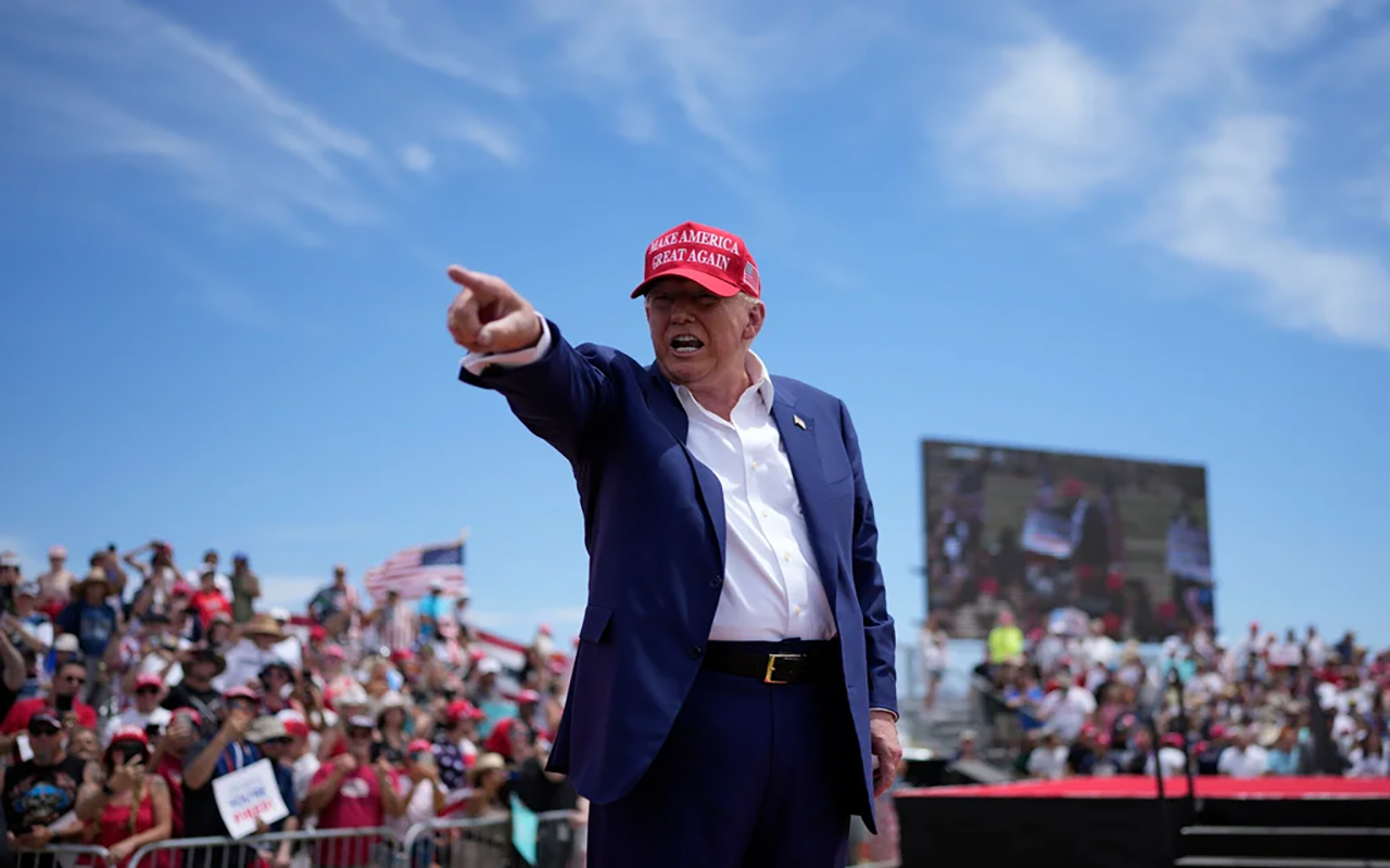 Republican presidential candidate, former President Donald Trump motions to the crowd after speaking at a campaign rally Sunday, June 9, 2024, in Las Vegas. (AP Photo/John Locher)