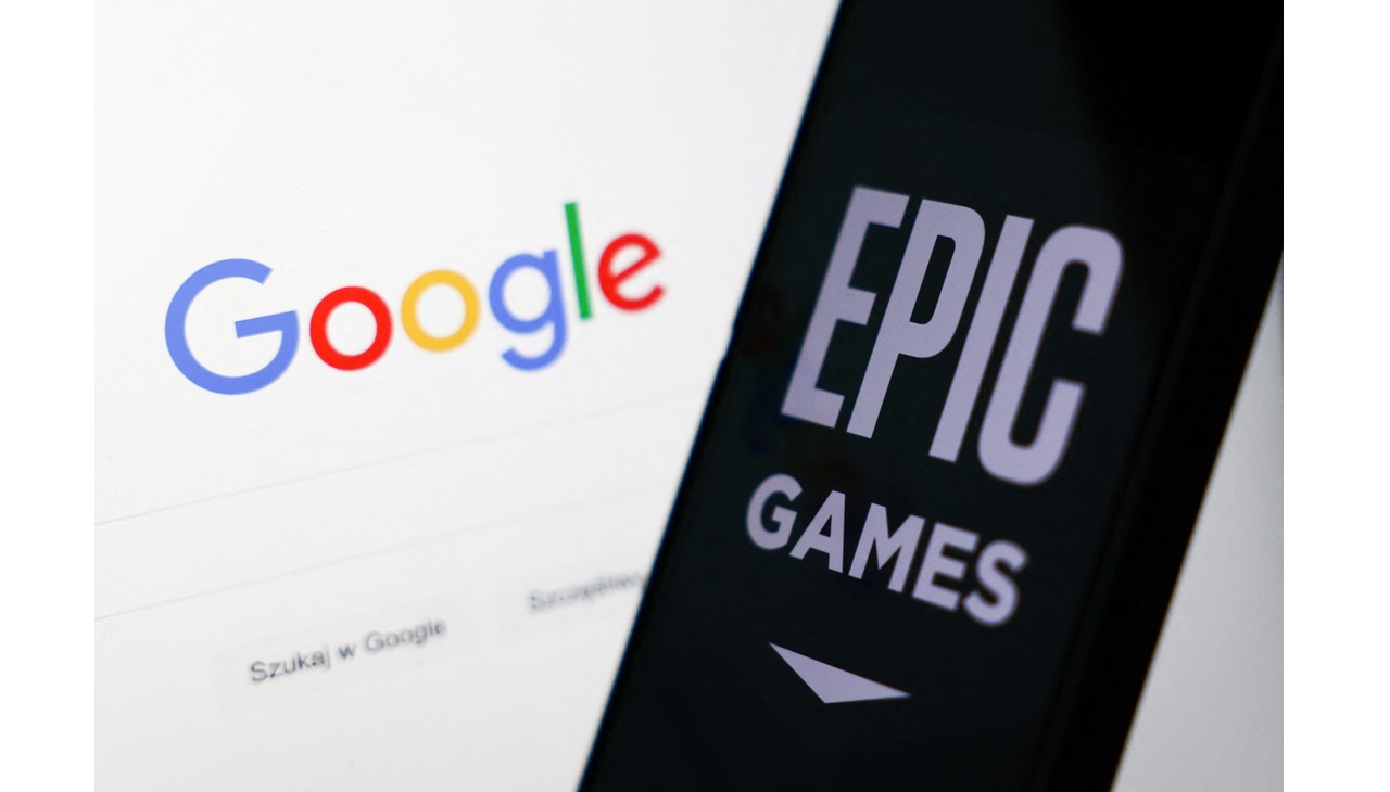 Google logo displayed on a laptop screen and Epic Games logo displayed on a phone screen are seen in this illustration photo taken in Krakow, Poland on October 1, 2024. (Photo by Jakub Porzycki/NurPhoto) (Photo by Jakub Porzycki / NurPhoto / NurPhoto via AFP)