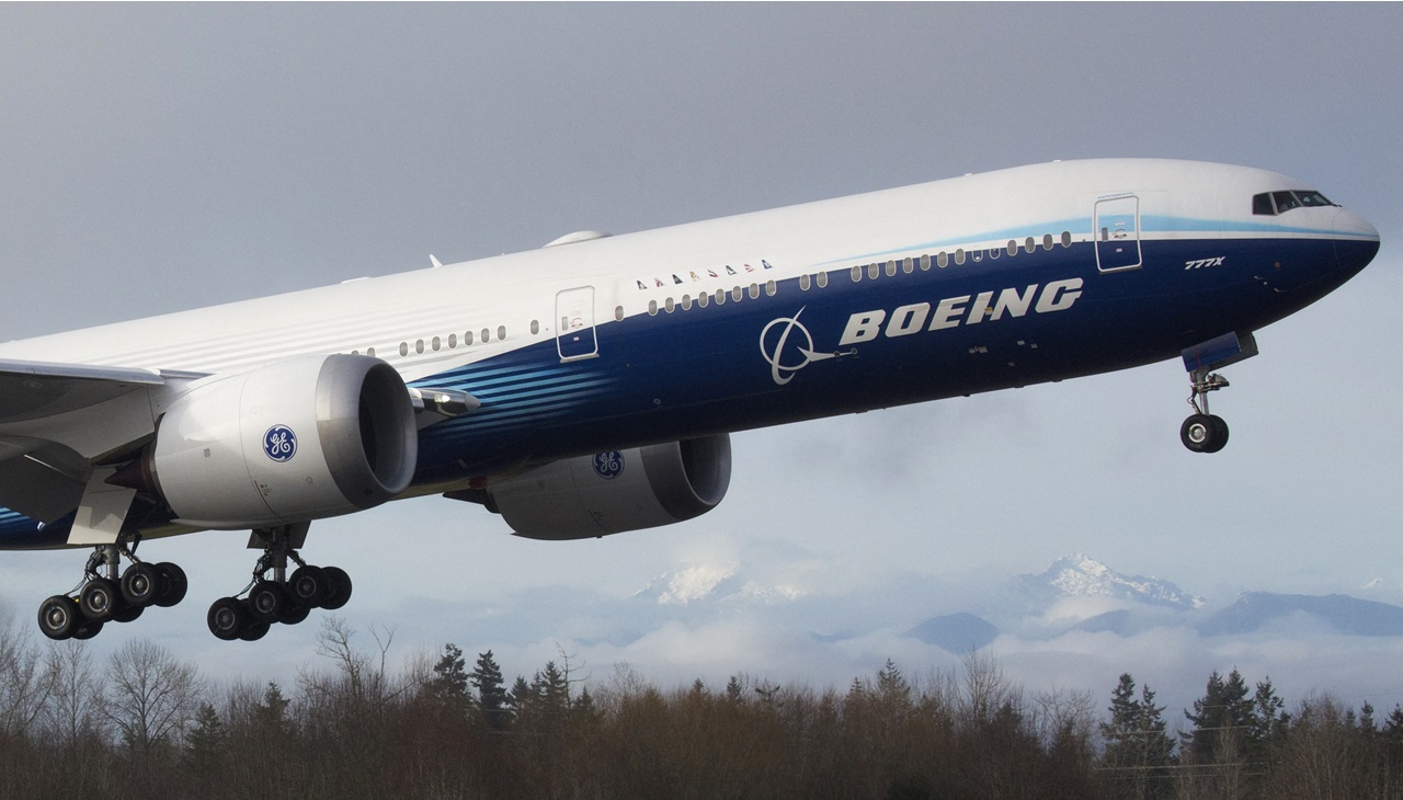 Takeoff of a Boeing aircraft. Photo by Jason Redmond / AFP