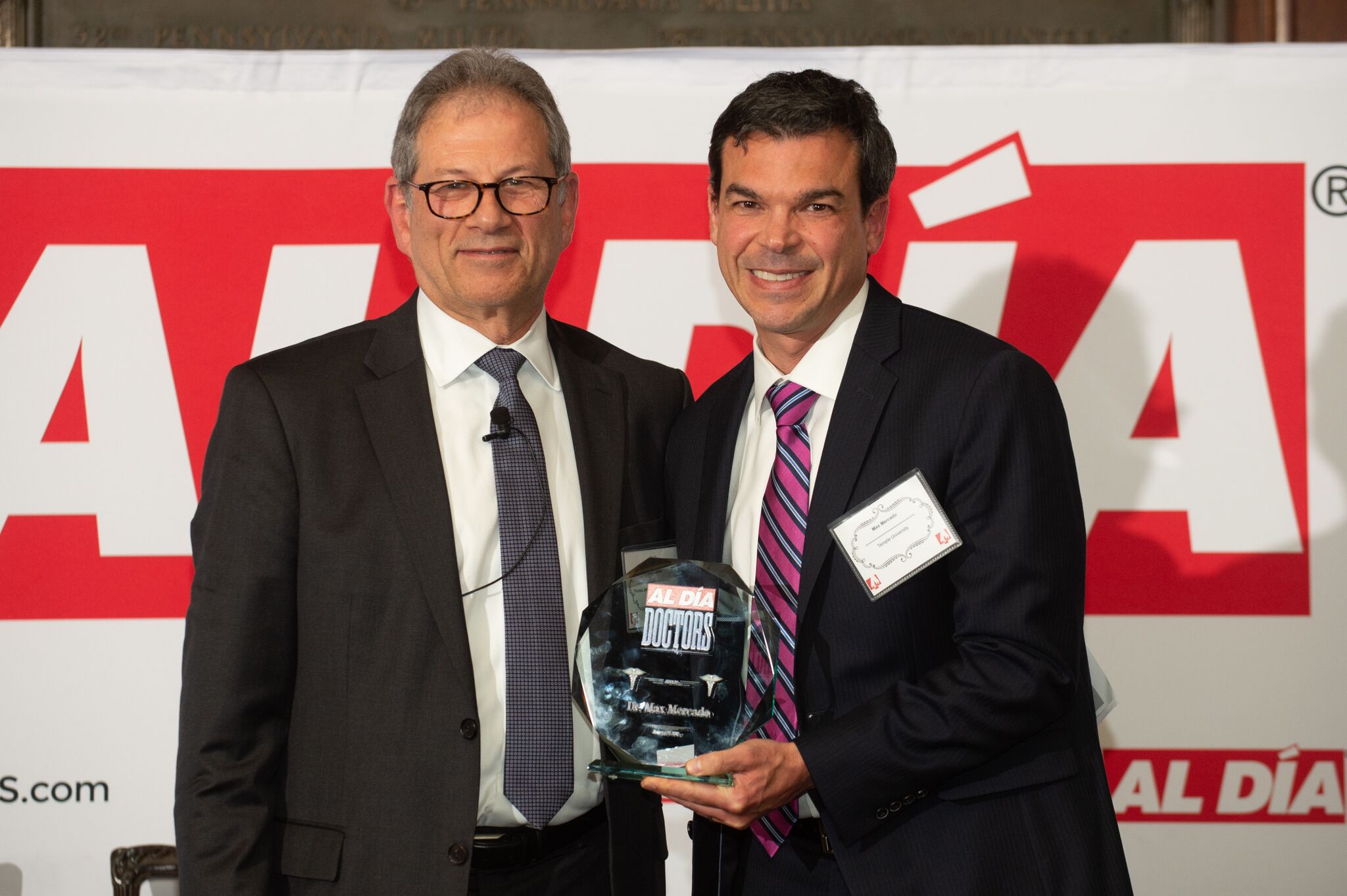 Dr. Max Mercado (right) was awarded with a Top Doctors award during the AL DÍA Top Doctors Forum on Thursday, Jan. 24. Photo: Todd Zimmermann / AL DÍA News.