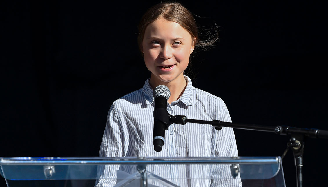 Swedish climate activist Greta Thunberg takes to the podium to address young activists and their supporters during the rally for action on climate change on September 27, 2019 in Montreal, Canada.  (Photo by Minas Panagiotakis/Getty Images)
