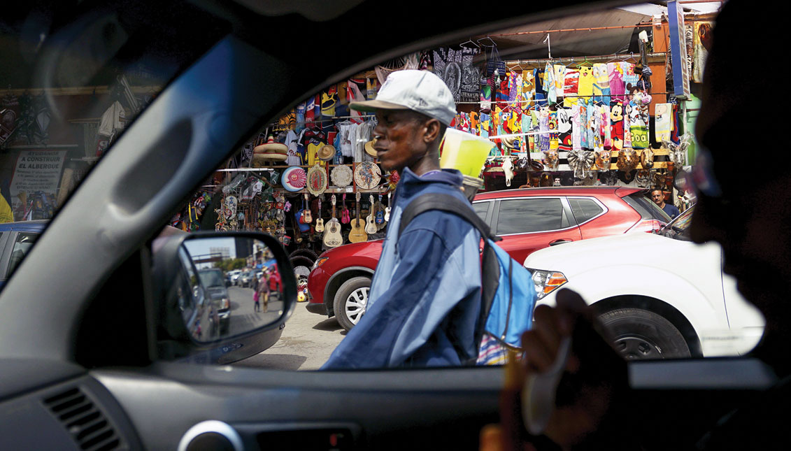 Motorists wait in line to enter the United States on May 31, 2019 in Tijuana, Mexico. President Donald Trump has proposed a 5% tariff on Mexican goods entering the U.S. unless they help stop illegal immigration.  (Photo by Sandy Huffaker/Getty Images)
