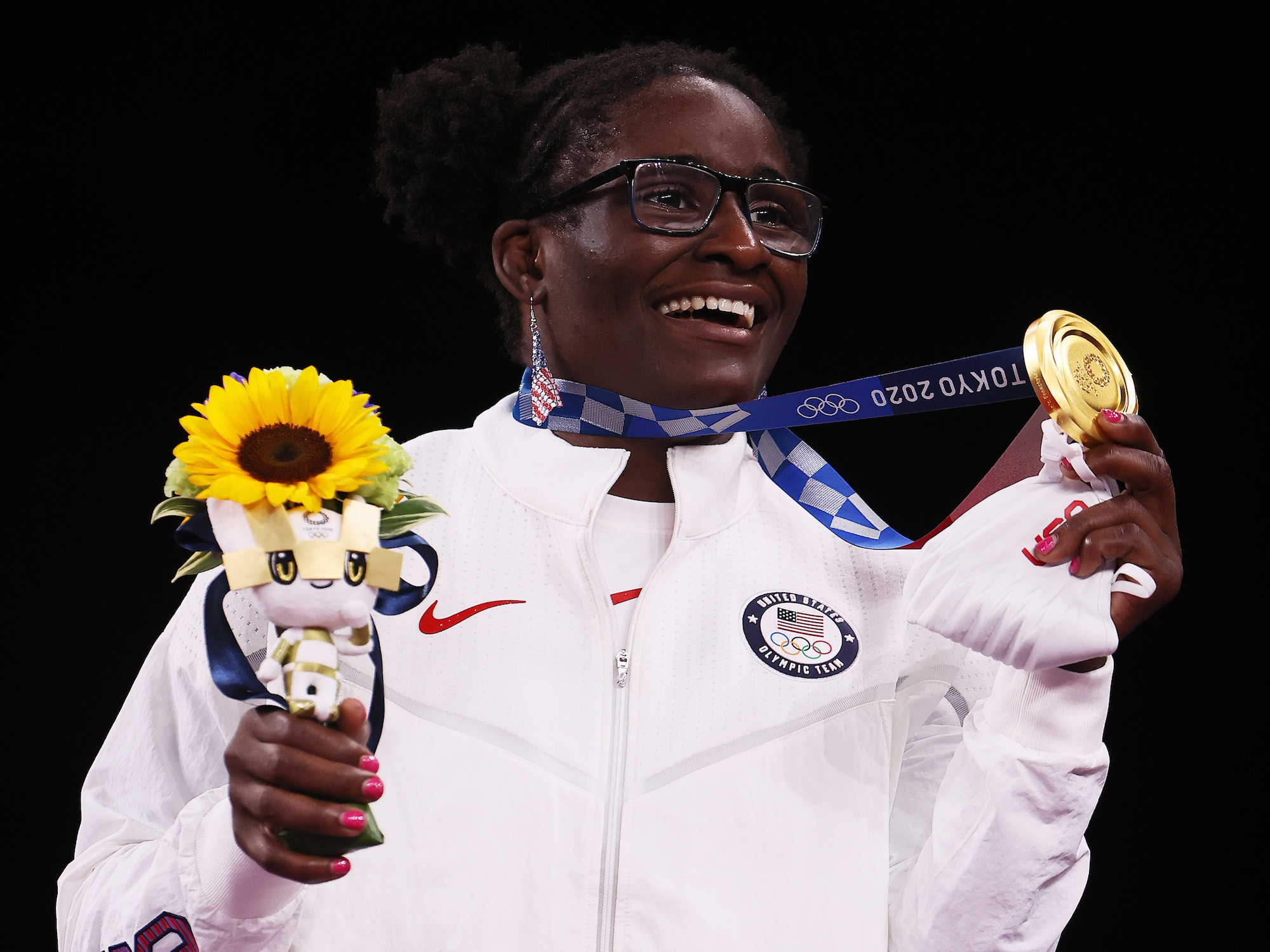 Team USA's Tamyra Mensah-Stock displays her gold medal Tuesday after the women's 68-kilogram freestyle wrestling final at the Tokyo Olympics. Photo: Tom Pennington/Getty Images